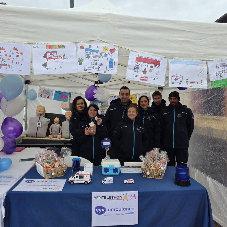 Équipe VYV Ambulance de Moissac sur le stand du Téléthon 2025